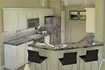 Country House Plan Kitchen Photo 01 - La Demeure Country French Home 007D-0162 - Shop House Plans and More