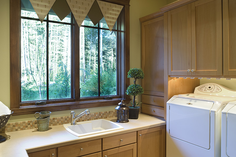 Luxury House Plan Laundry Room Photo 01 - Patterson Pier Luxury Craftsman Home 011S-0087 - Shop House Plans and More
