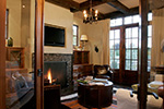 Sunbelt House Plan Fireplace Photo 01 - DeMere European Home Home 011S-0088 - Search House Plans and More