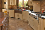 Arts & Crafts House Plan Kitchen Photo 01 - Waterstone Luxury Home 013S-0009 - Shop House Plans and More