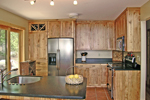 Country House Plan Kitchen Photo 01 - Quailrun Rustic Acadian Home 016D-0102 - Search House Plans and More