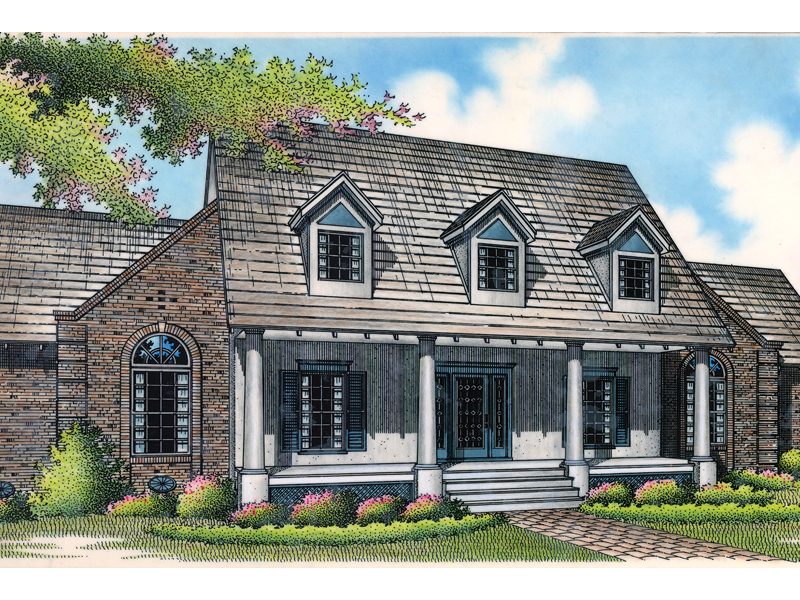A Trio Of Dormers And Relaxing Porch Decorate Front