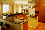 Relaxed kitchen floor plan with dining space nearby.