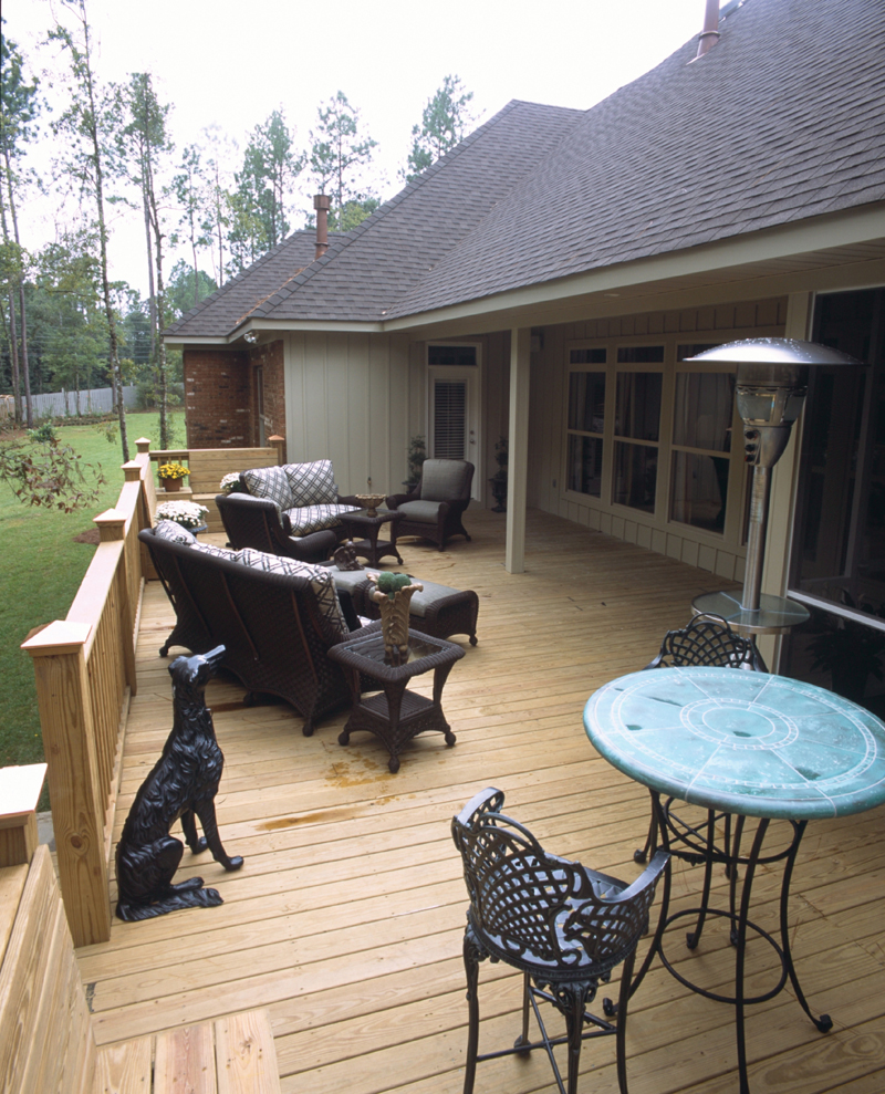 Expansive outdoor deck across the back of the home takes comfortable living directly to the outdoors
