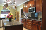 Colonial House Plan Kitchen Photo 03 - Halifax Lane Lowcountry Home 028D-0018 - Search House Plans and More