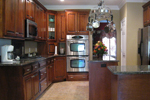 Colonial House Plan Kitchen Photo 04 - Halifax Lane Lowcountry Home 028D-0018 - Search House Plans and More