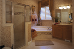 Florida House Plan Master Bathroom Photo 01 - Lakeport Luxury Home 047D-0211 - Shop House Plans and More