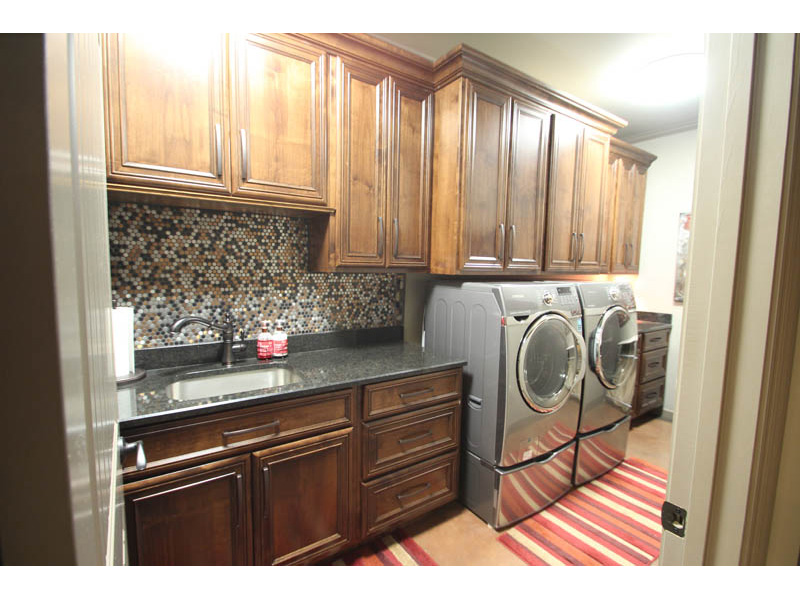 Luxury House Plan Laundry Room Photo 01 - Macedonian Escape Ranch Home 055D-0932 - Shop House Plans and More