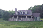 Farmhouse Plan Front Photo 02 - Raven Ranch Country Home 055D-0976 - Shop House Plans and More