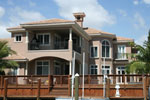 Adobe House Plans & Southwestern Home Design Rear Photo 04 - Picayne Point Waterfront Home 106S-0067 - Shop House Plans and More