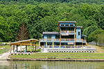Waterfront House Plan Front of Home - 141D-0348 - Shop House Plans and More